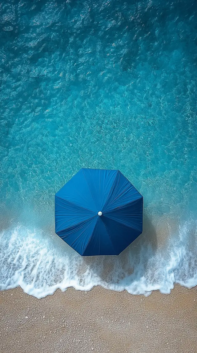  A small beach umbrella lying flat viewed from above.