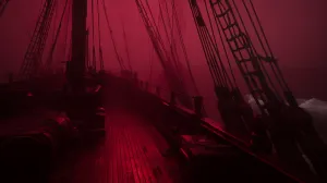 Ship on Water Under Red Light